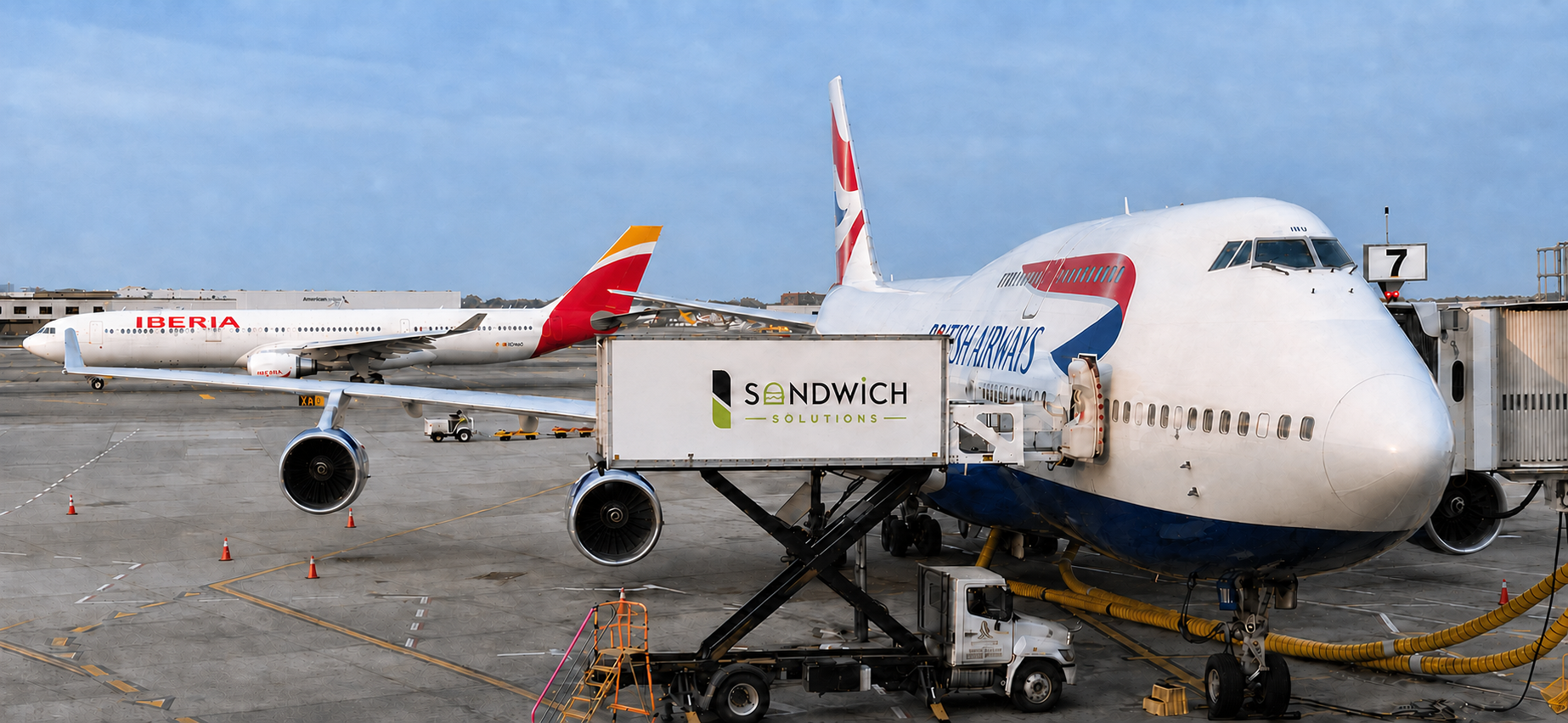 Sandwich Solutions Ltd airline catering truck loading a British Airways aircraft